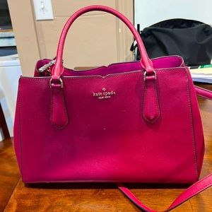 Kate Spade on carried it for one week….In great condition